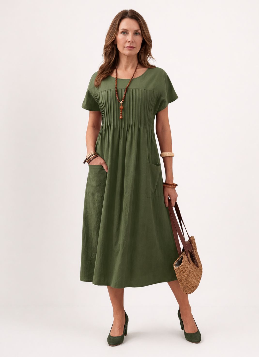 Vestido Midi Solto com Manga Curta e Bolsos Laterais