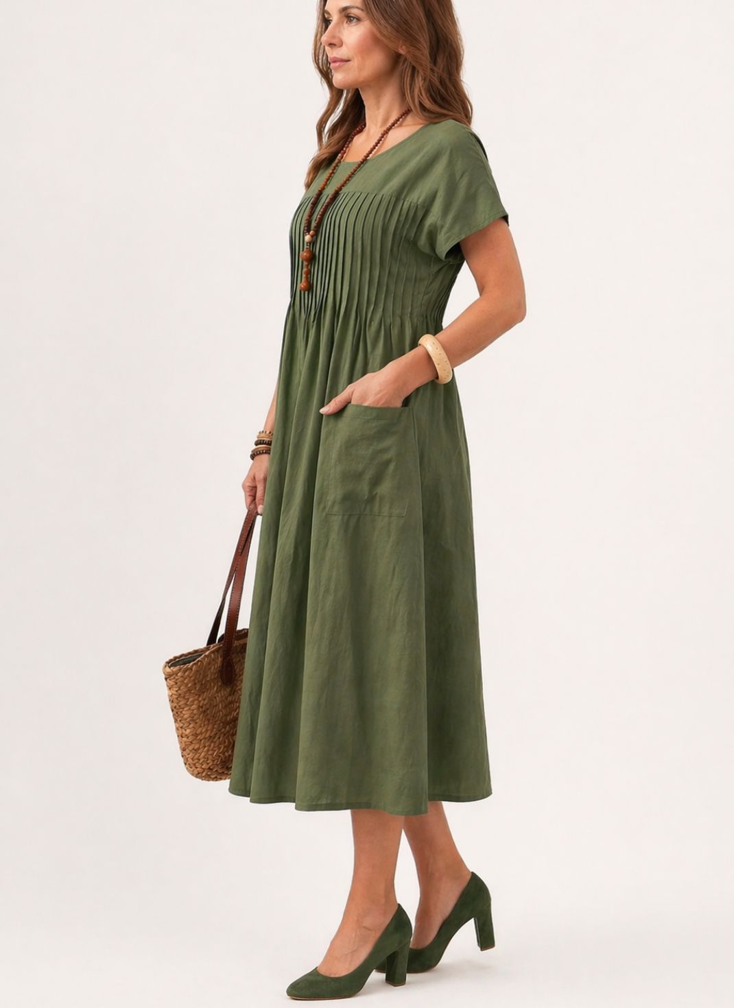 Vestido Midi Solto com Manga Curta e Bolsos Laterais