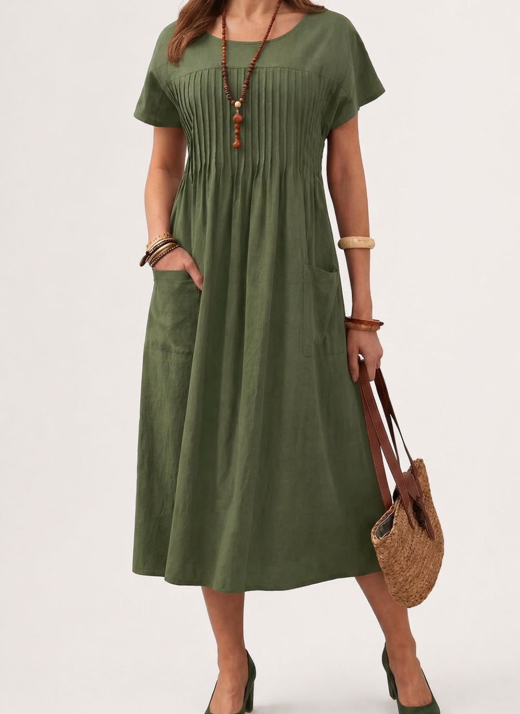Vestido Midi Solto com Manga Curta e Bolsos Laterais